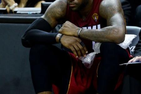 NBA finals: LeBron overheats as Miami wilt 