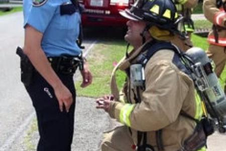 Fireman fakes a fire emergency to propose to policewoman girlfriend