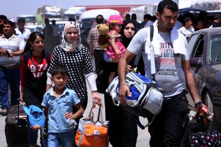 Jihadists take over Iraq town as half  a million people flee 
