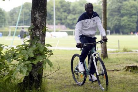 On his bike! Free agent Sagna signs for Man City
