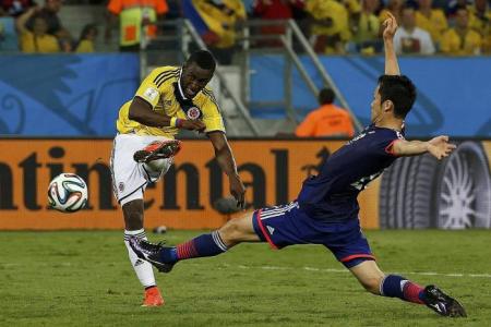 Colombia seal top spot as Japan crash out