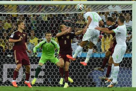 Slimani's equaliser gives Algeria historic last-16 spot