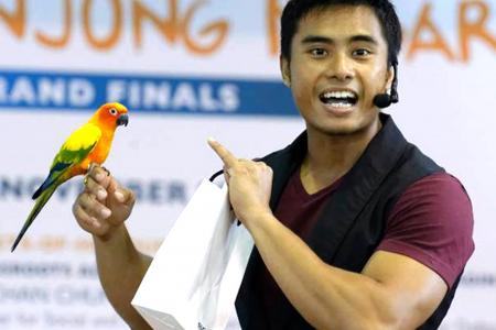 Manhunt finalist is Singapore's hunkiest "parrot whisperer"