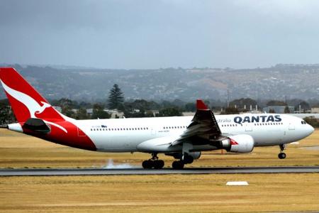 Water leak turns Qantas plane aisle into a river during flight