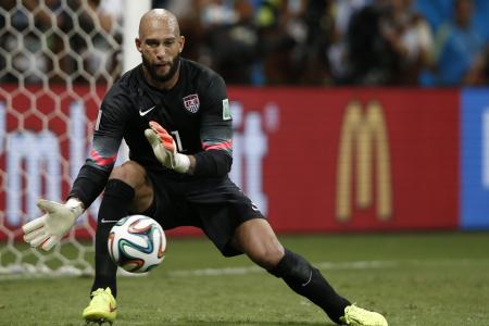 Tim Howard makes another great block - against enthusiastic fan