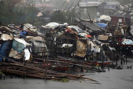 Hundreds of thousands evacuated as typhoon batters the Philippines