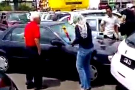 M'sian woman who attacked elderly man's car officially says sorry