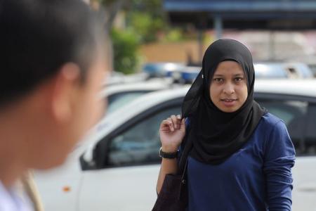 Police detain M'sian woman who attacked elderly man's car