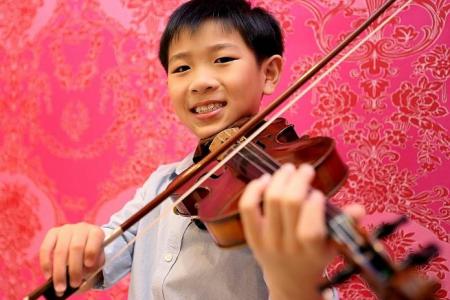 S'pore boy, 9, tops international violin competition