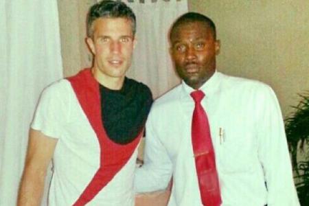 Waiter suspended over photo with RVP