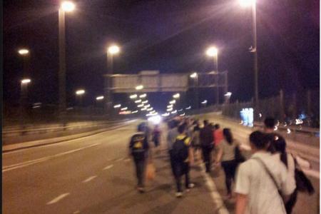 M'sian bus strike: Workers, school kids forced to walk to S'pore checkpoint
