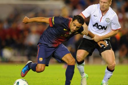 Which Man Utd player does Xavi regret not playing with?