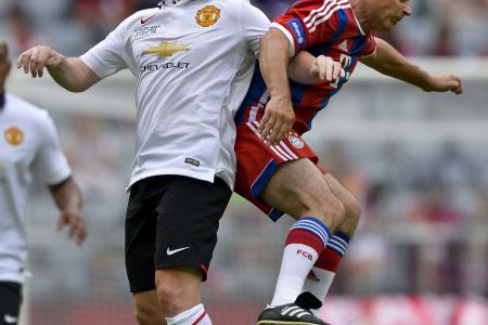 World Cup winner Schweinsteiger asks and gets football hero Scholes' shirt at half-time