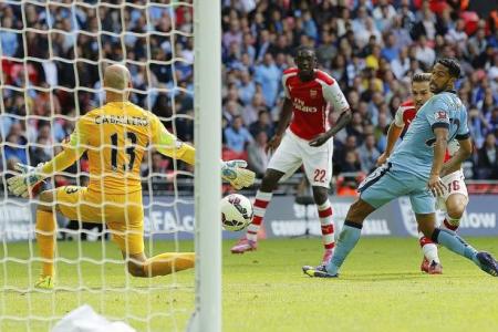 Gunners sink the Blues of Manchester