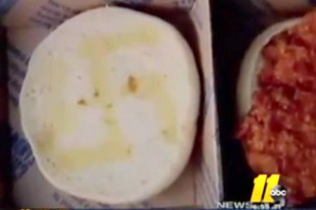 McDonald's apologises for bun with swastika on it