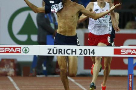 French runner strips before finish, officials strip him of gold medal