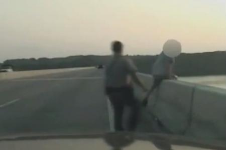 VIDEO: State trooper runs out of car to save suicidal man