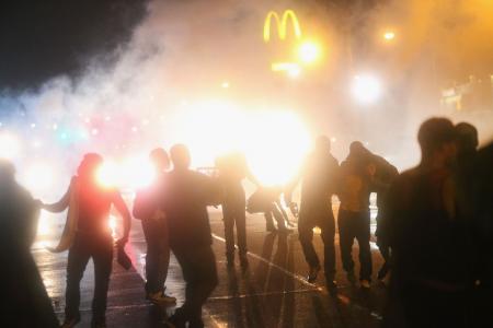 Protesters defy curfew in riot-shaken US town
