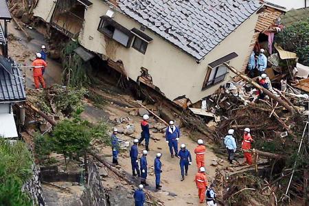 Landslide buries homes, kills at least 18 people in Japan