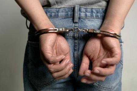 Philippine police arrest 8 in online child 'sextortion' case