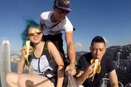 Hong Kong teenagers take crazy video selfie on top of skyscraper