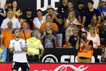 Peter Lim's Valencia go top with 3-0 win