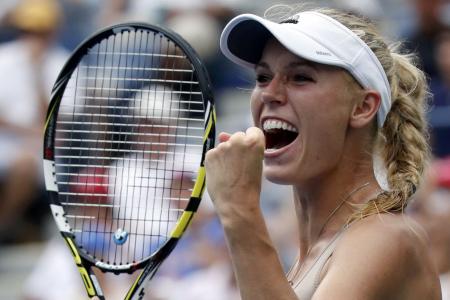 TENNIS: Emotional win for Wozniacki over Sharapova at U.S. Open