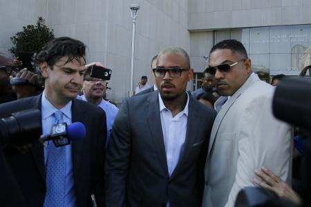 Chris Brown pleads guilty to punching fan for photo-bombing
