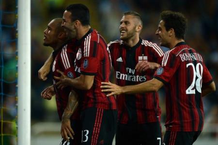 AC Milan scrap through after nine-goal thriller
