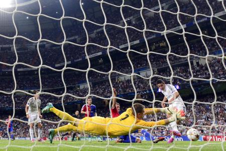 Champions League holders Real back on song with 5-1 rout of Basel