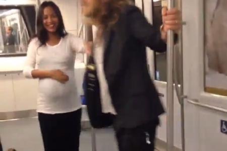 WATCH: Zoe Saldana pole dance, baby bump and all, in airport Aerotrain