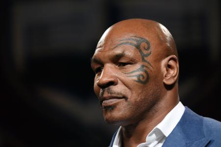 Mike Tyson helps motorcyclist hurt in accident