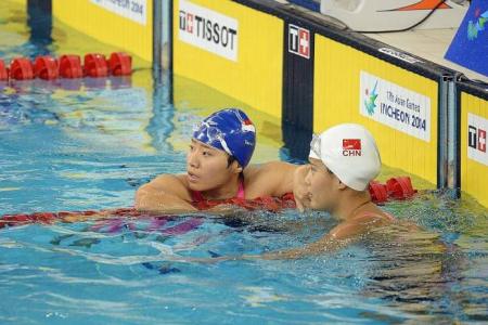 Tao Li denied 50m butterfly three-peat