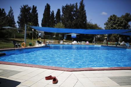 Boy, 12, watches helplessly as sisters drown in KL pool