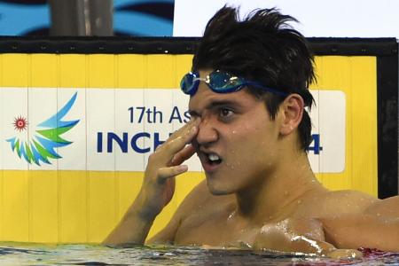 Schooling not too happy with silver and a place in the history books
