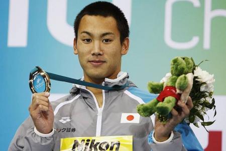 Japanese swimmer admits camera theft