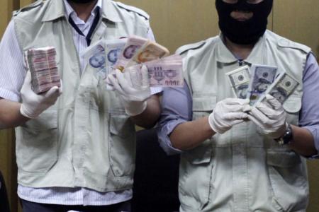 S'pore dollars seized in graft probe involving Riau Governor