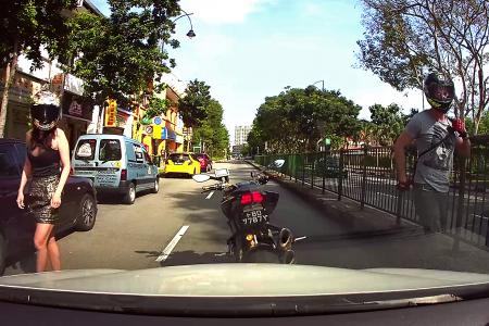 Road rage at Tanjong Katong: Biker smashes driver's window with fist