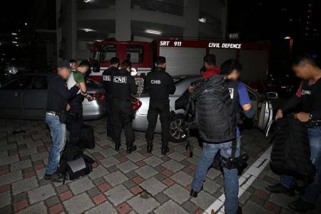 Four arrested after 4-hour plus stand-off after CNB raid