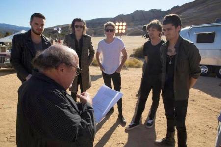 Is that Danny DeVito on the set of One Direction's new music video?