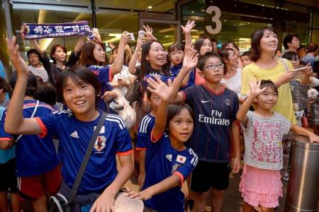 Fanfare at Japan's arrival  at Changi airport