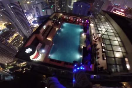 Base jumpers take off from KL Tower and land in pool party