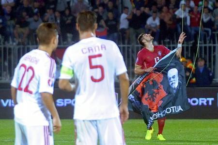 PHOTO GALLERY: Serbia, Albania face UEFA sanctions after drone stunt and mass brawl