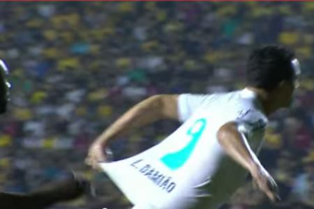 Brazil striker facing ban for tugging own shirt
