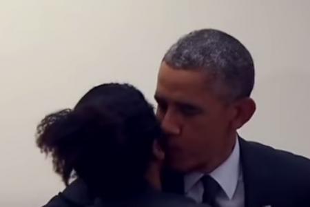 Obama kisses a voter after her boyfriend jokingly tells him not to touch her 