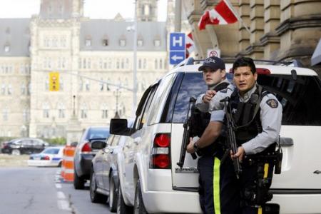 Gunman who killed soldier and stormed Canadian parliament was on terror watch list