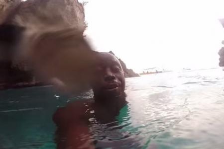 Jamaican films himself taking a 24m heart-stopping leap from a cliff 