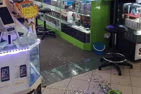 Sim Lim Square shop refunds woman $1,010 in coins