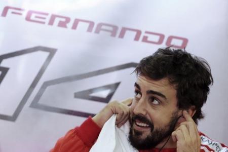 F1 racing: Watch as Fernando Alonso becomes a fireman when Ferrari engine bursts into flames