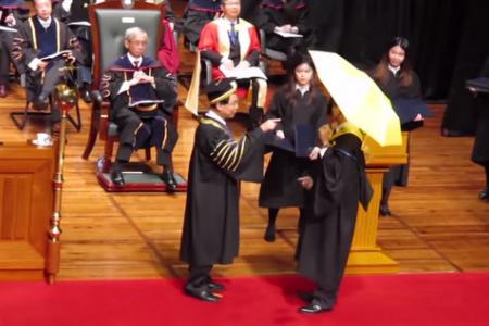 WATCH: Hong Kong student refused diploma after opening yellow umbrella at graduation ceremony      